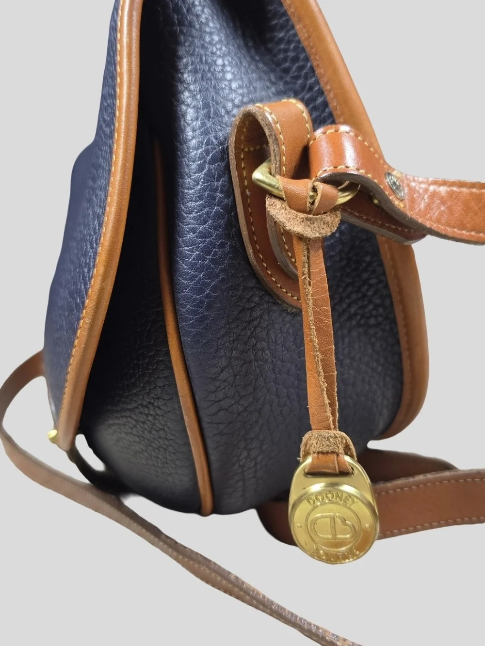 Vintage Dooney & Bourke Cavalry Trooper Saddle Bag Navy Blue Tan AWL Crossbody